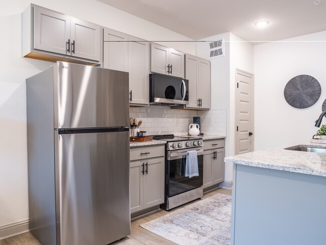 Building Photo - The Flats at Ransley