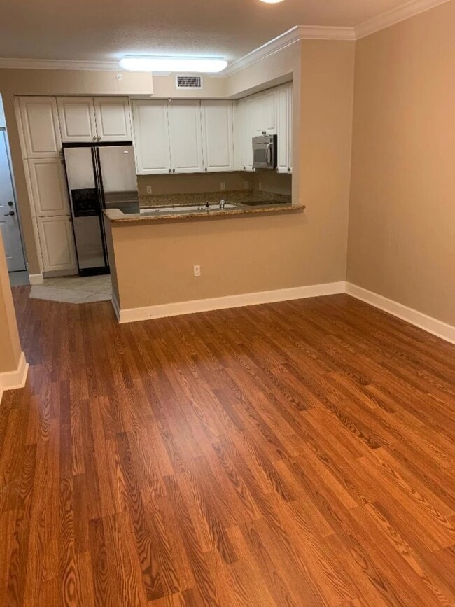 Living room facing kitchen - 1109 Renaissance Way