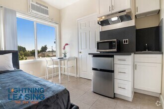 Building Photo - 5120 S Avalon Blvd