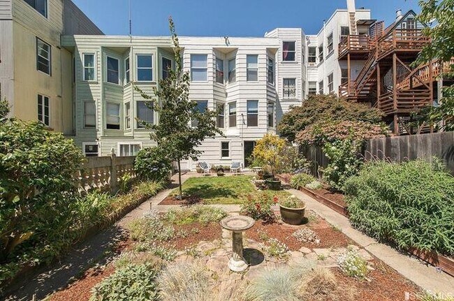 Yard facing rear of building - 361 Church St