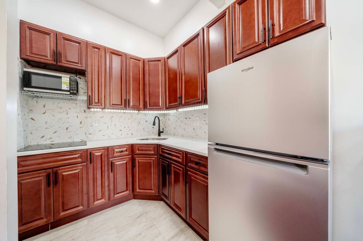 Foto del edificio - 211 W 122nd St