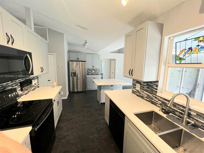 Building Photo - 6846 Royal Palm Beach Blvd