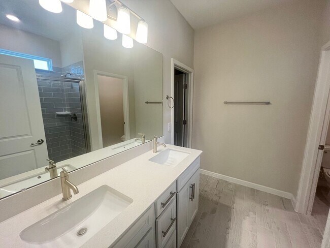 Building Photo - Welcome to this BRAND NEW 4-bedroom, 2-bathroom home located in the community of Canopy Terrace
