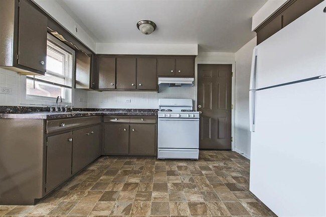 Foto del edificio - 14123-25 S Tracy Ave