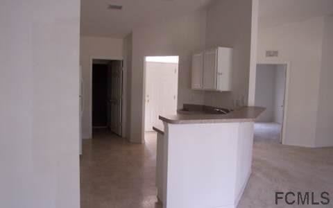 Building Photo - 7 Poinsettia Ln