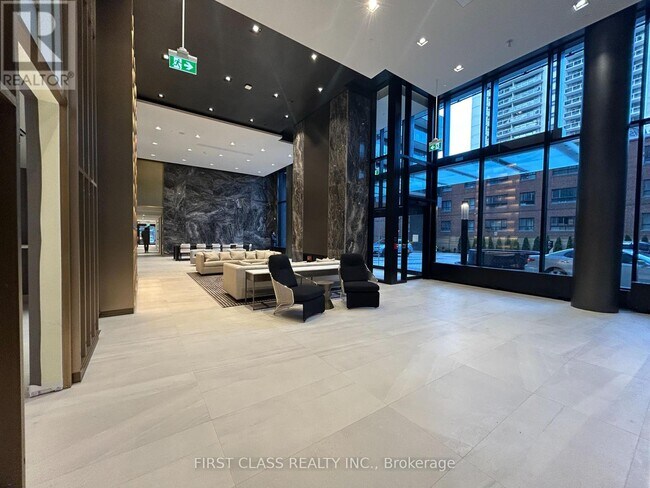 Photo du bâtiment - 127-1127 Broadway Ave