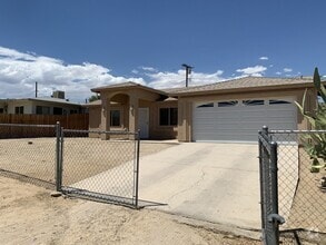 Building Photo - 61750 Petunia