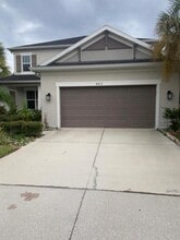 Building Photo - 8812 Tropical Palm Dr