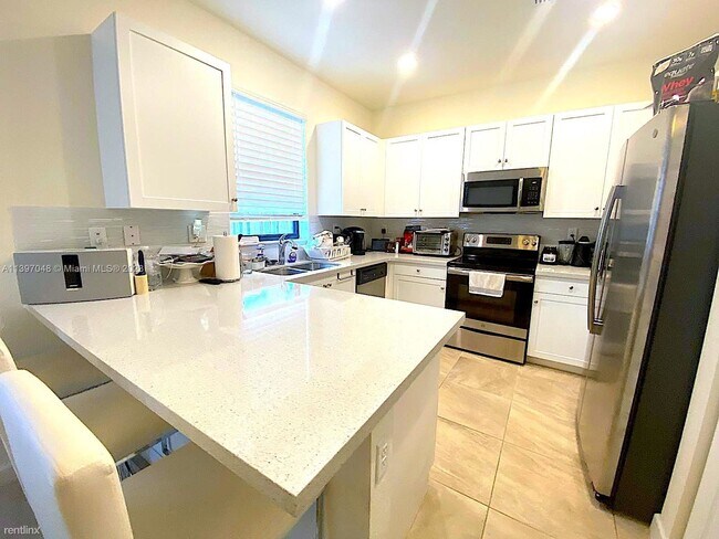 Building Photo - 3 br, 2.5 bath Townhome - 6556 S Anise Ct