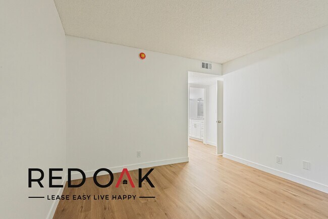 Building Photo - ~1 Month FREE~ Sun Drenched Two Bedroom wi...