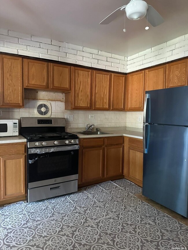 Building Photo - 22-44-44 78th St