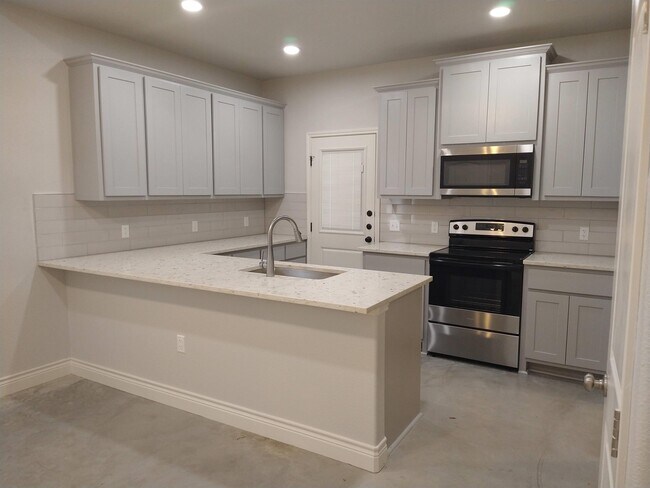 Foto del edificio - 1000 Wooded Holw Ct