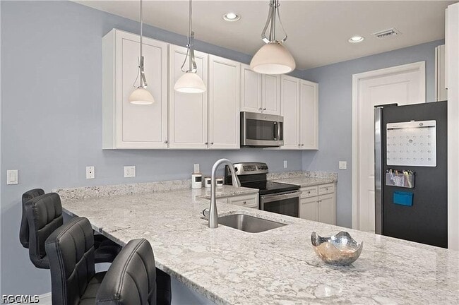 Building Photo - 15800 Portofino Springs Blvd