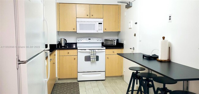 Building Photo - 9195 Collins Ave