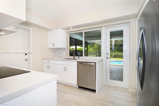 Foto del edificio - 4 br, 3 bath House - 7765 SW 133rd Ter