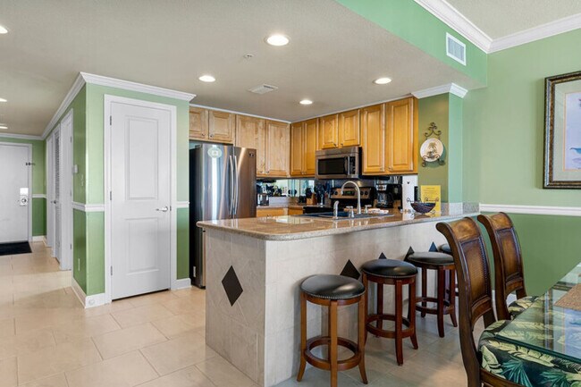 Building Photo - Beachfront Bliss: Luxe 3BR Condo at Mariso...
