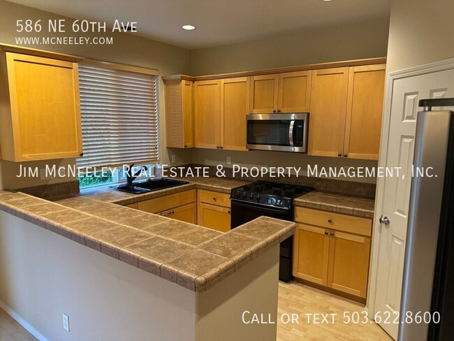 Building Photo - 586 NE 60th Ave