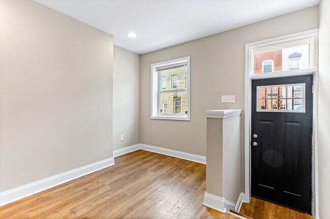 Foto del edificio - Parkside Haven: Contemporary 2-Bedroom Row...