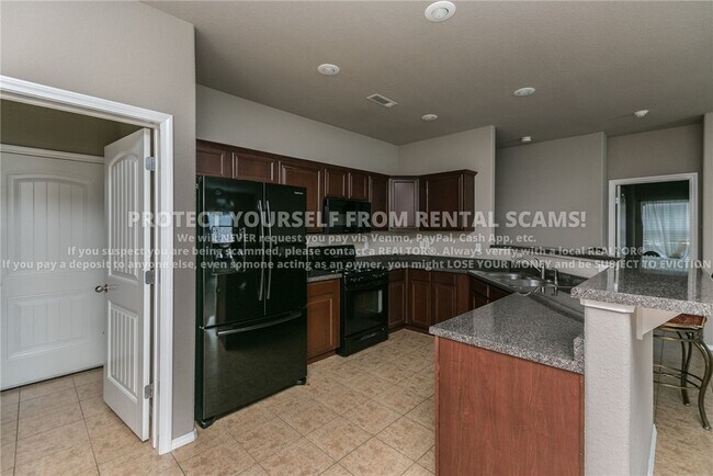 Building Photo - 4400 W Serviceberry Dr