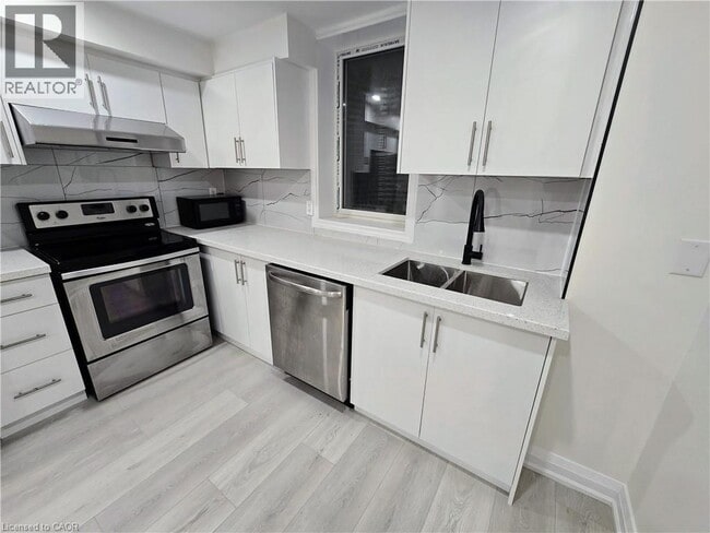 Photo du bâtiment - 147 Langlaw Dr