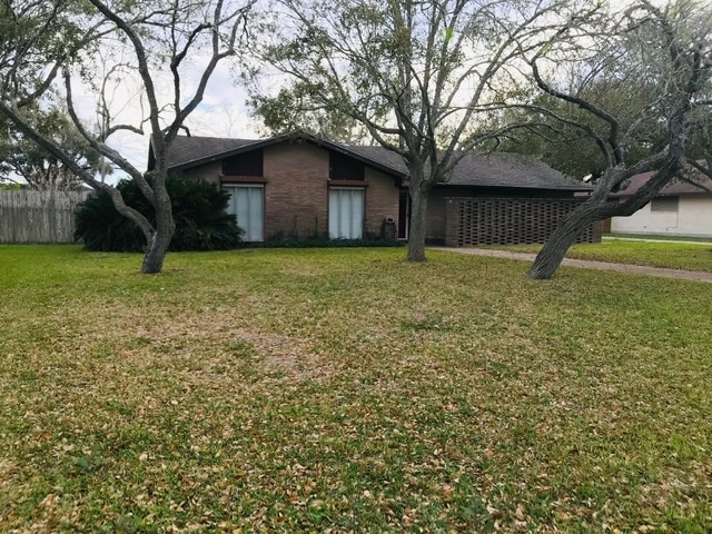 Large brick home with 3 bedrooms and 2 baths, nice backyard - 614 E 10th St