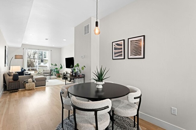 Building Photo - Modern 2-Bedroom Rowhome with Rooftop Moun...