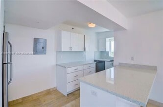 Building Photo - 5900 Collins Ave
