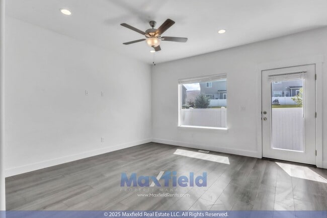 Building Photo - Spacious 5-Bedroom End-Unit Townhome with ...