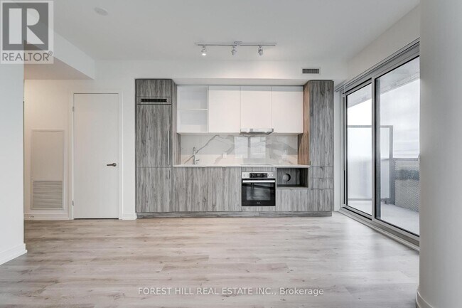 Building Photo - 138-7138 Downes St