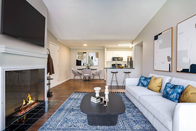 Open concept living area looking into dining and kitchen areas - Avana Bellevue