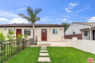 Building Photo - 6917 Encino Ave