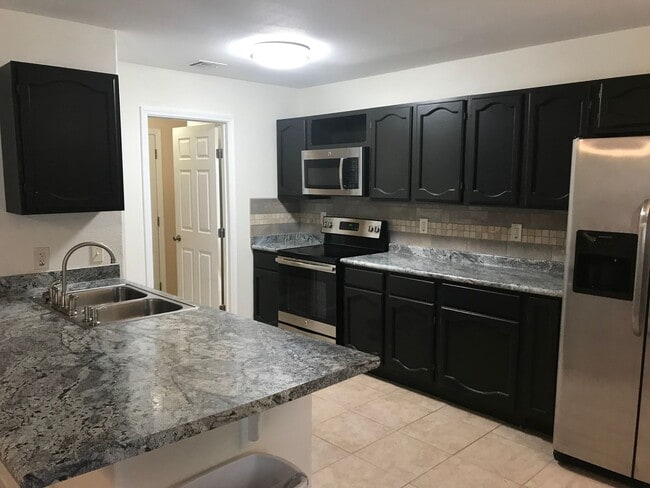 Building Photo - COMING SOON! 3 Bed / 2 Bath – Updated Home with Fireplace & Shaded Backyard