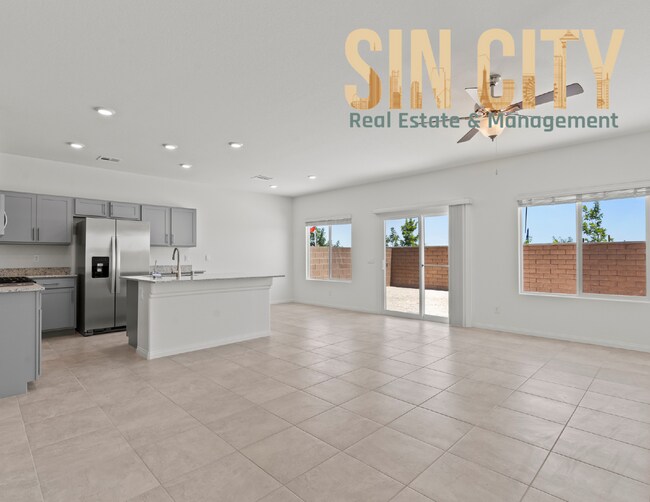 Foto del edificio - "Charming 4-Bed Home on Love Springs Ln: Spacious 1865 Sq Ft with 2.5 Baths in North Las Vegas!"