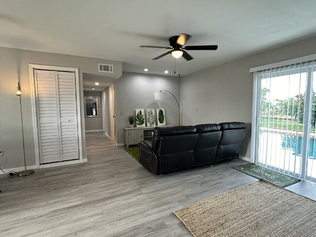 Building Photo - "Elegant 3-Bed Waterfront pool Home"