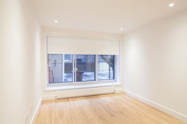 Building Photo - 4570-4590 Queen-Mary