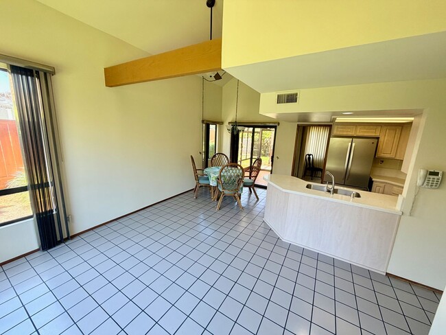 Foto del edificio - Private Oasis with Sunroom, Balcony & Lush Landscaping | 4BR Home Near Community Pool & Spa