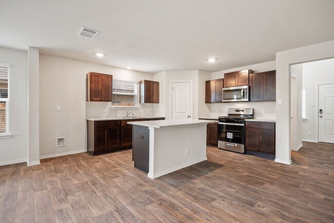 Building Photo - Almost New In Whisper Falls!!!