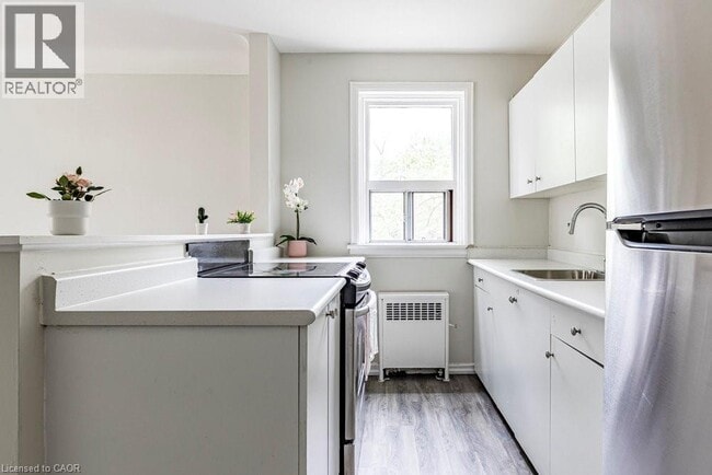 Photo du bâtiment - 118 St Joseph's Dr