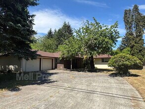 Building Photo - 7016 Husky Way SE