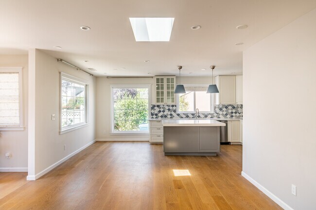 Dining & Kitchen area with large windows - 1051 Park Ave