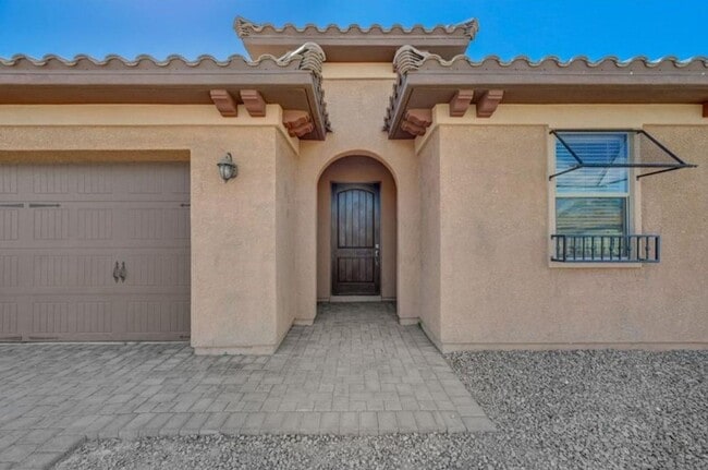 Building Photo - BEAUTIFUL 4 BEDROOM HOME IN GUARD GATED COMMUNITY!