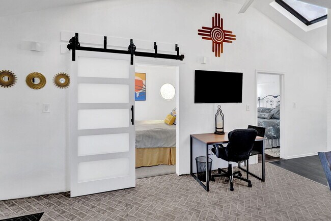 Living area with TV & Desk - 1406 W 76th St