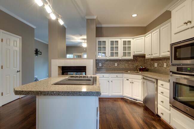 The kitchen is fresh and open - 104 Carriage Ct.