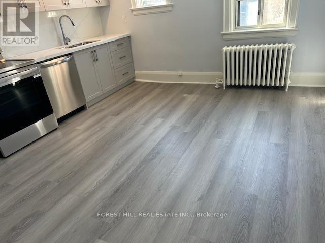 Photo du bâtiment - 411-411 Spadina Rd