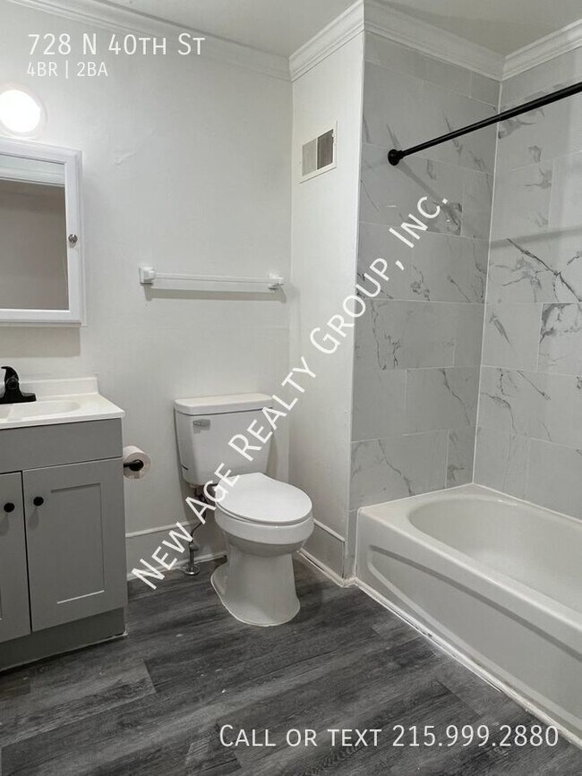 Foto del edificio - Four Bedroom, Bi-level Apartment in Belmon...