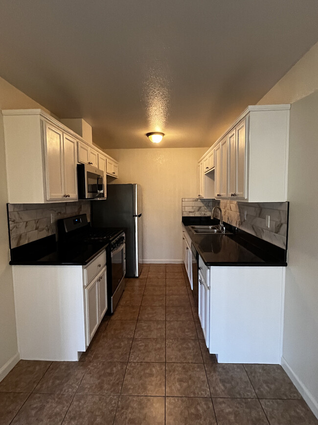 All new stainless appliances, cabinetry update. - 1817 Piedmont Way