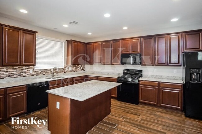 Building Photo - 8149 Begonia Blush Dr