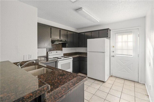 Building Photo - 1219 W Carmen Ave