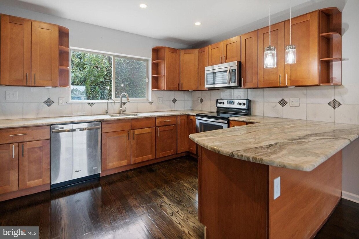 Primary Photo - Spacious 4-Bedroom Home with Outdoor Space...