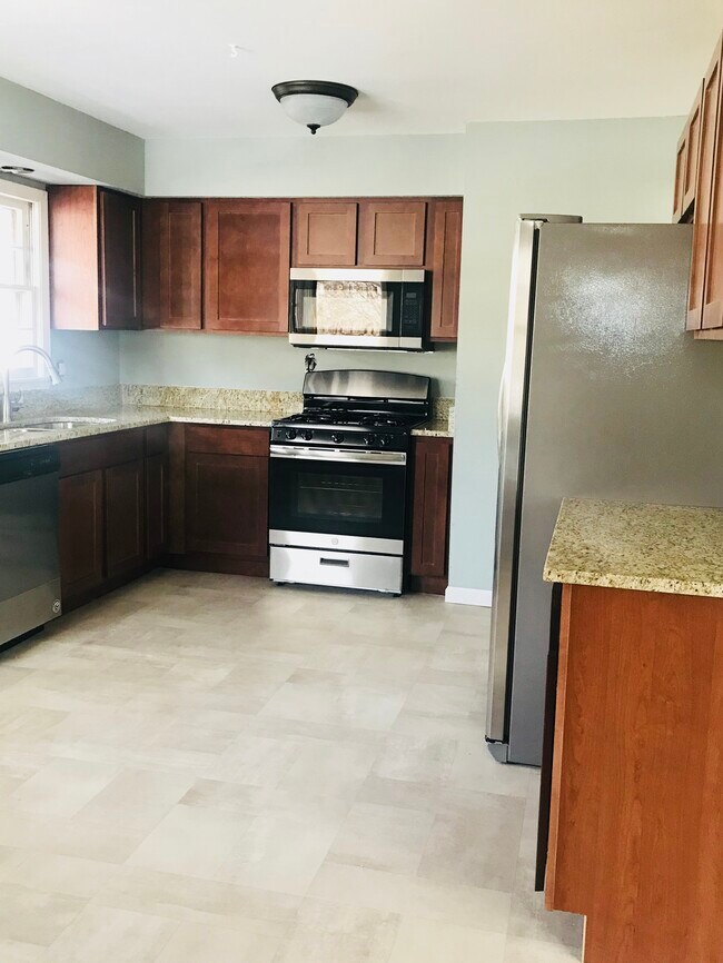 Granite countertops and Stainless Steel appliances - 3652 Upton Ave N